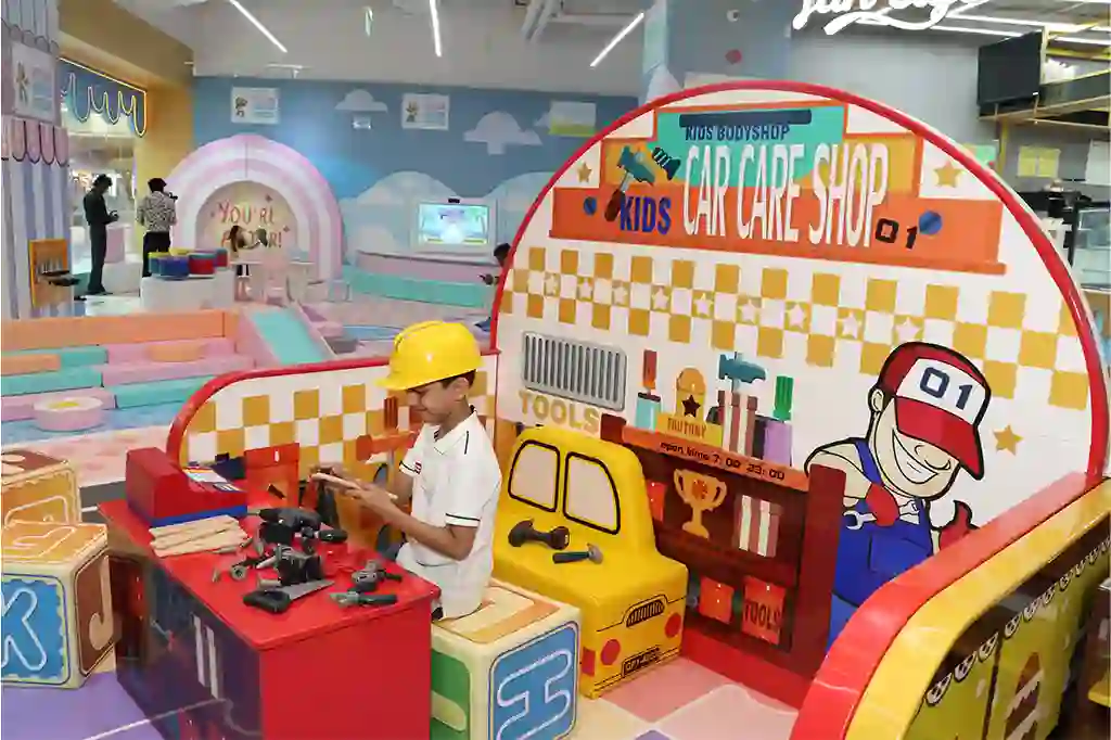 Child engaged in a play-based learning activity at Funblock's builder zone, developing problem-solving, creativity, and independent thinking.